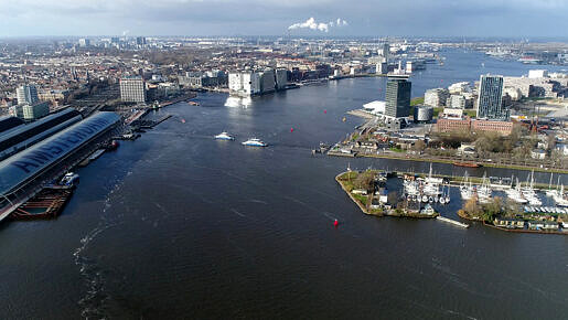 Aerial,photo,of,amsterdam,ij,the,ferries,moving,over,water
